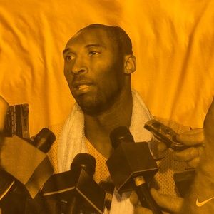 Kobe Bryant yellow press conference t-shirt
